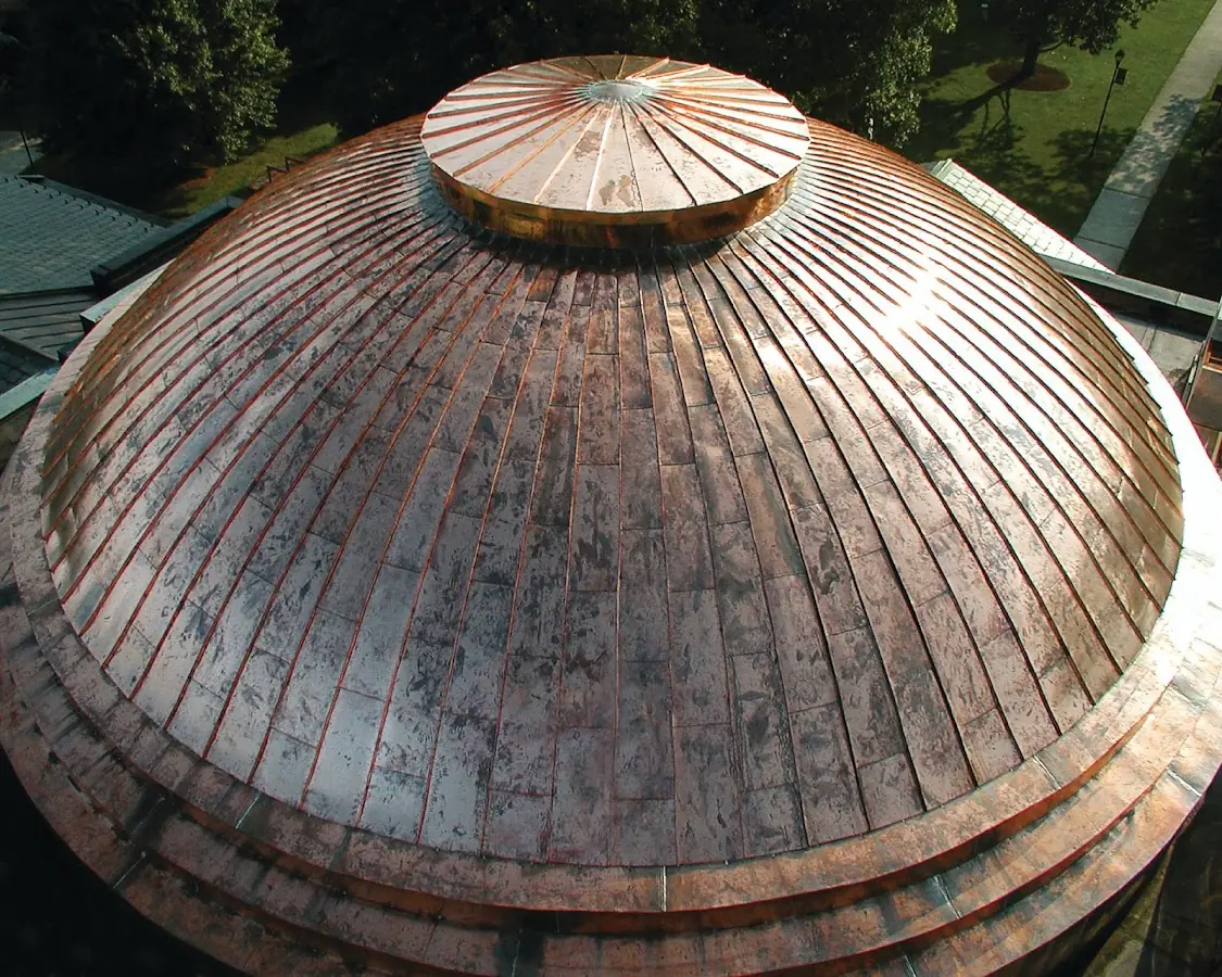 Craftsman Roofing crew installing a new roof in Main Street Merchants